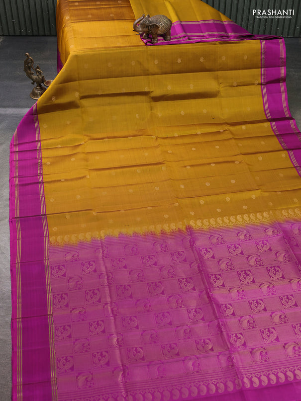 Pure soft silk saree dark mustard and pink with zari woven buttas and rettapet zari woven border
