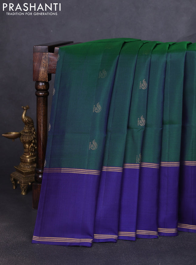 Pure soft silk saree dual shade of green and blue with allover zari woven buttas and rettapet zari woven border
