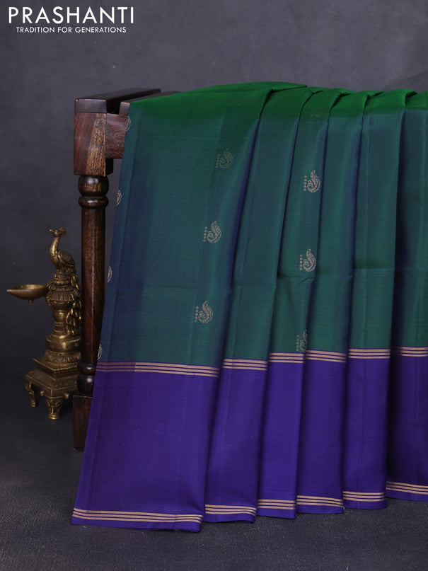 Pure soft silk saree dual shade of green and blue with allover zari woven buttas and rettapet zari woven border