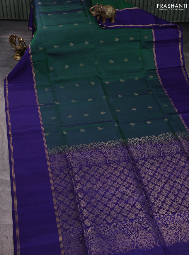 Pure soft silk saree dual shade of green and blue with allover zari woven buttas and rettapet zari woven border