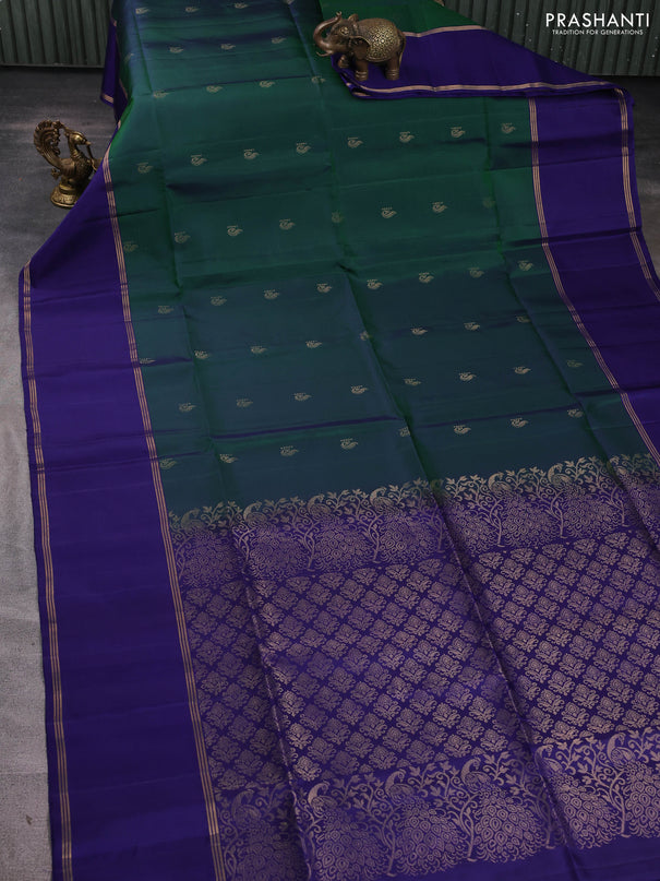 Pure soft silk saree dual shade of green and blue with allover zari woven buttas and rettapet zari woven border