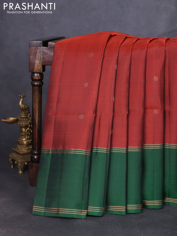 Pure soft silk saree rust shade and green with allover zari woven buttas and rettapet zari woven border