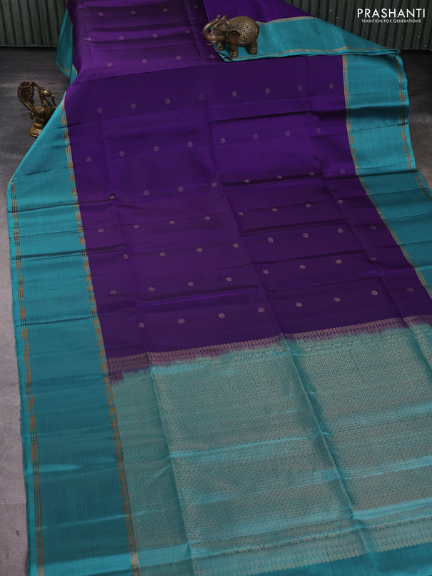 Pure soft silk saree violet and teal blue with allover zari woven buttas and rettapet zari woven border