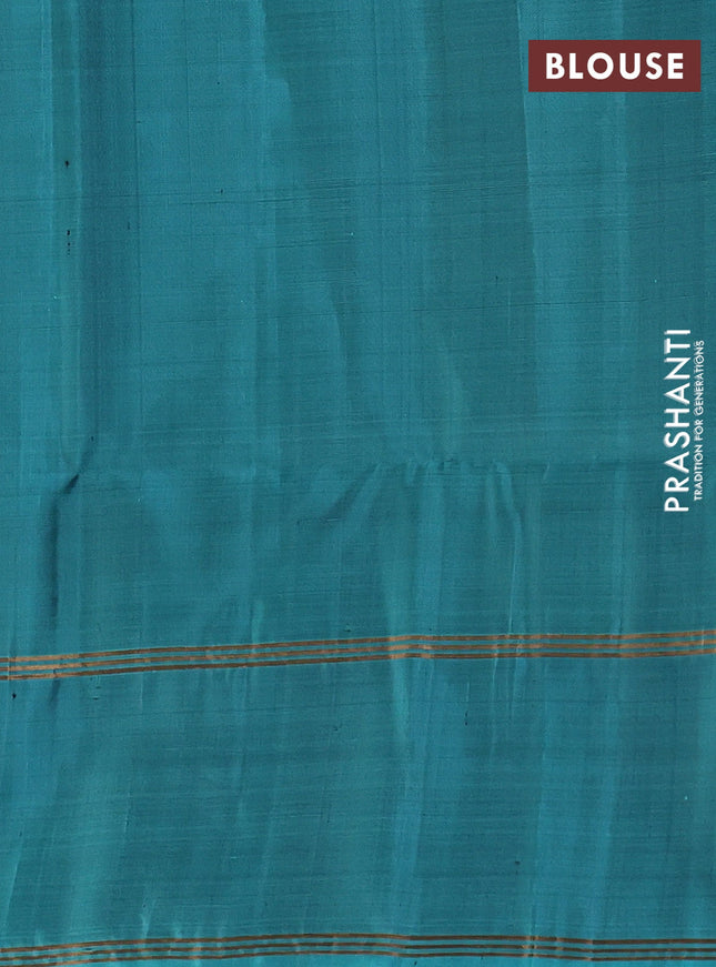 Pure soft silk saree violet and teal blue with allover zari woven buttas and rettapet zari woven border