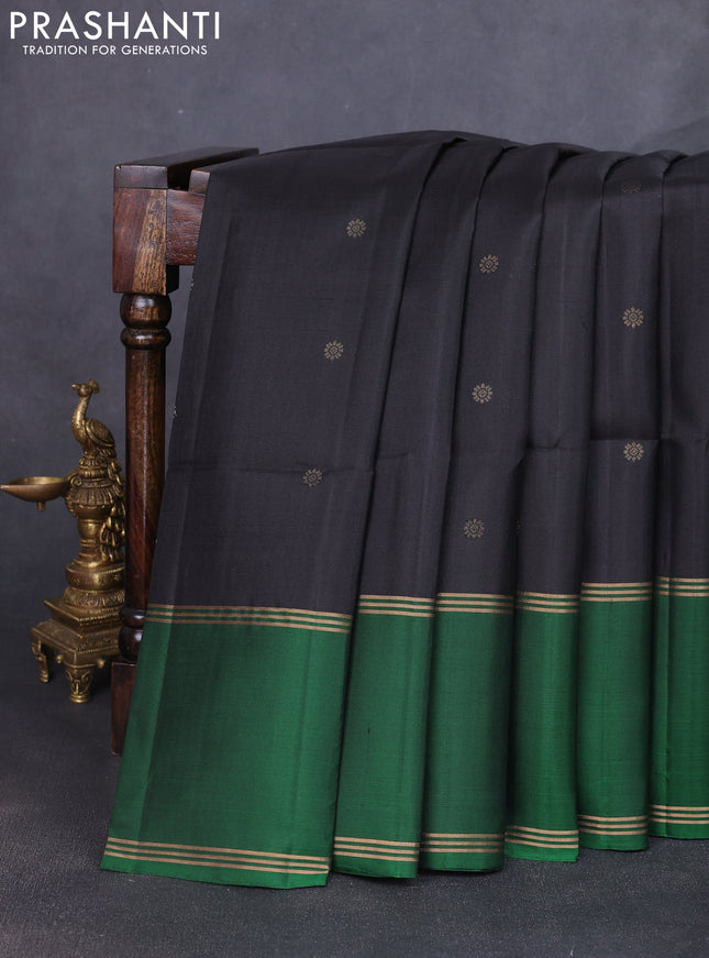 Pure soft silk saree black and green with allover zari woven buttas and rettapet zari woven border