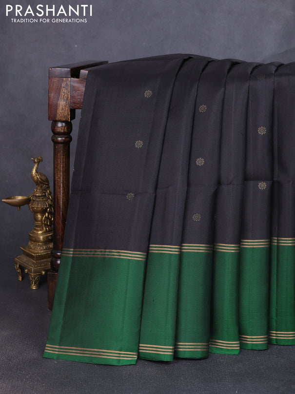 Pure soft silk saree black and green with allover zari woven buttas and rettapet zari woven border