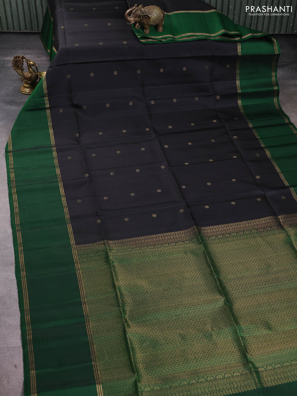Pure soft silk saree black and green with allover zari woven buttas and rettapet zari woven border