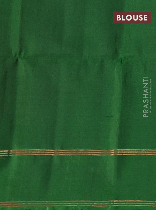 Pure soft silk saree rust shade and green with allover zari woven buttas and rettapet zari woven border