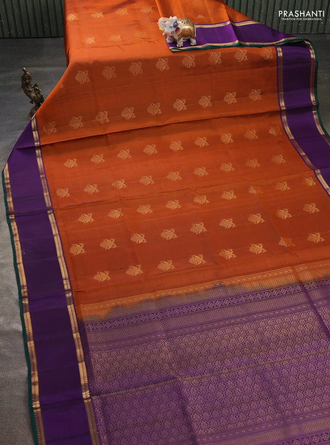 Pure soft silk saree rust shade and purple with allover zari woven buttas and rettapet zari woven border
