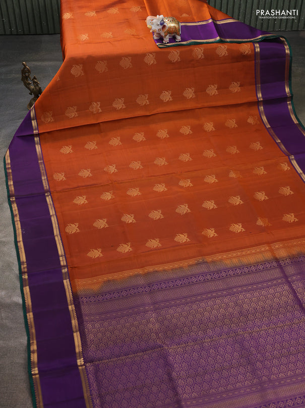 Pure soft silk saree rust shade and purple with allover zari woven buttas and rettapet zari woven border