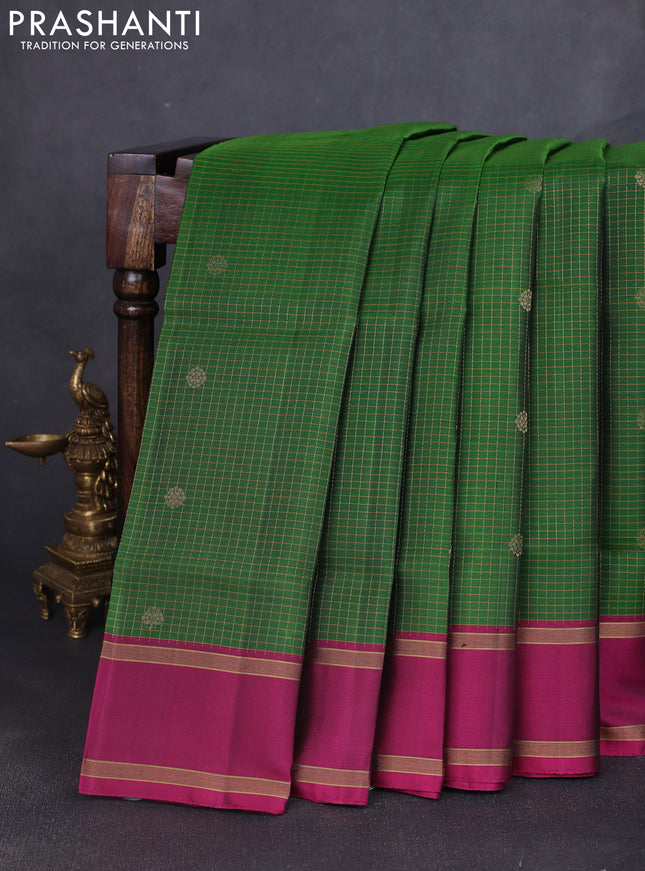 Pure soft silk saree green and purple with allover zari checks & buttas and rettapet zari woven border