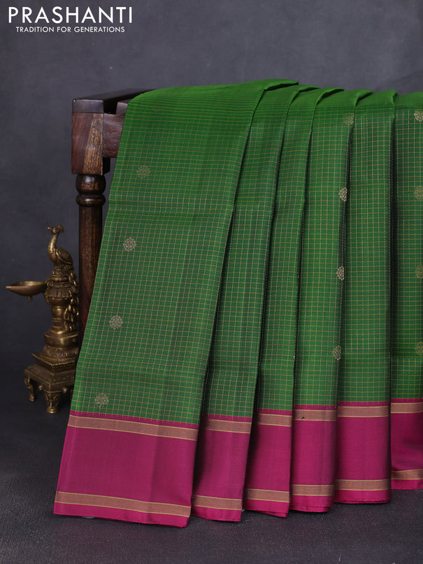 Pure soft silk saree green and purple with allover zari checks & buttas and rettapet zari woven border