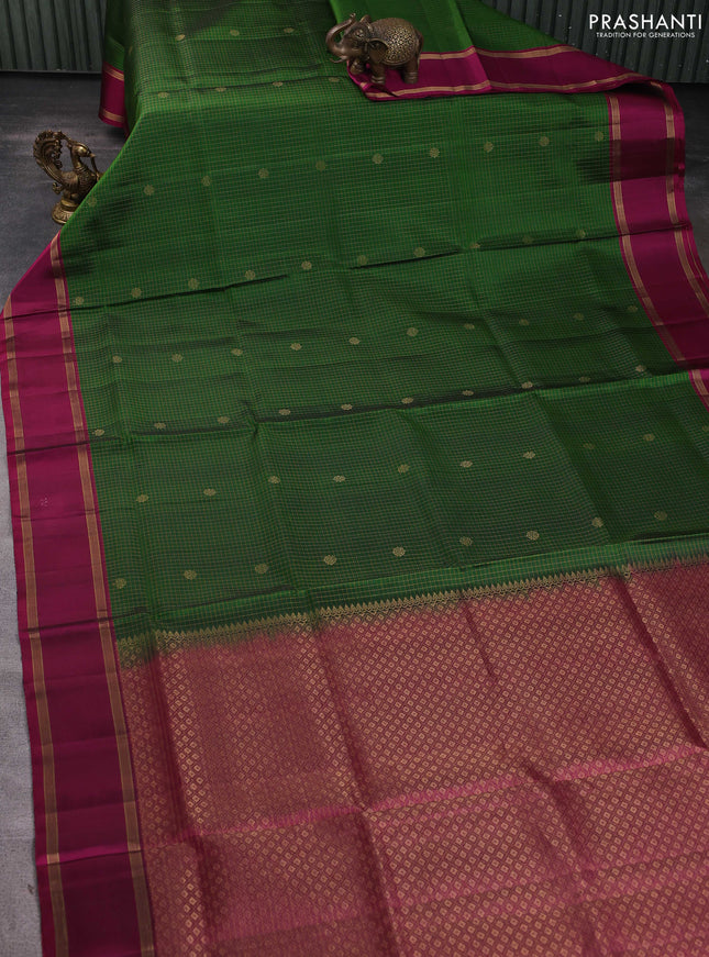 Pure soft silk saree green and purple with allover zari checks & buttas and rettapet zari woven border