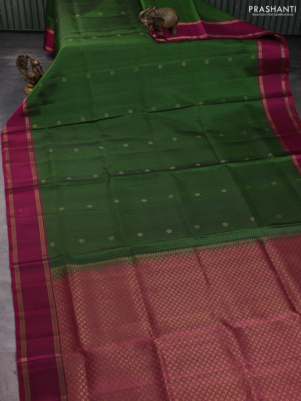 Pure soft silk saree green and purple with allover zari checks & buttas and rettapet zari woven border