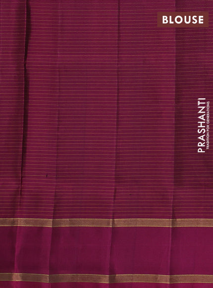 Pure soft silk saree green and purple with allover zari checks & buttas and rettapet zari woven border