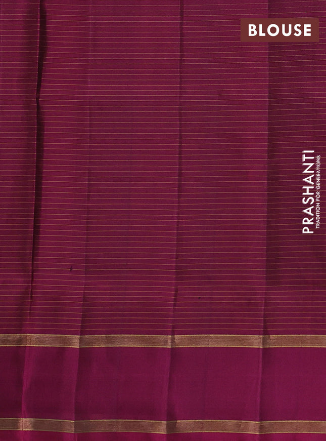 Pure soft silk saree green and purple with allover zari checks & buttas and rettapet zari woven border