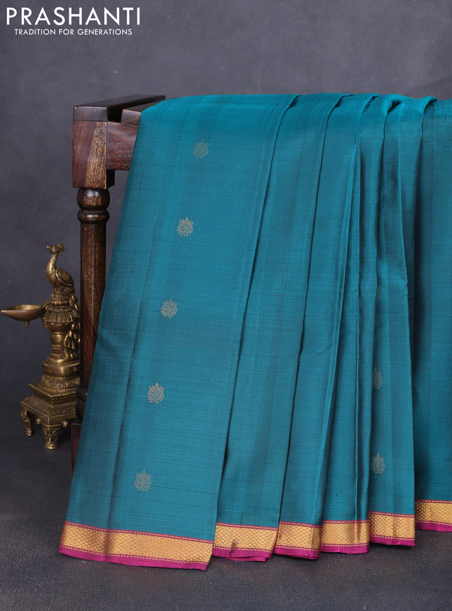 Pure soft silk saree teal green and magenta pink with zari woven buttas and small zari woven border