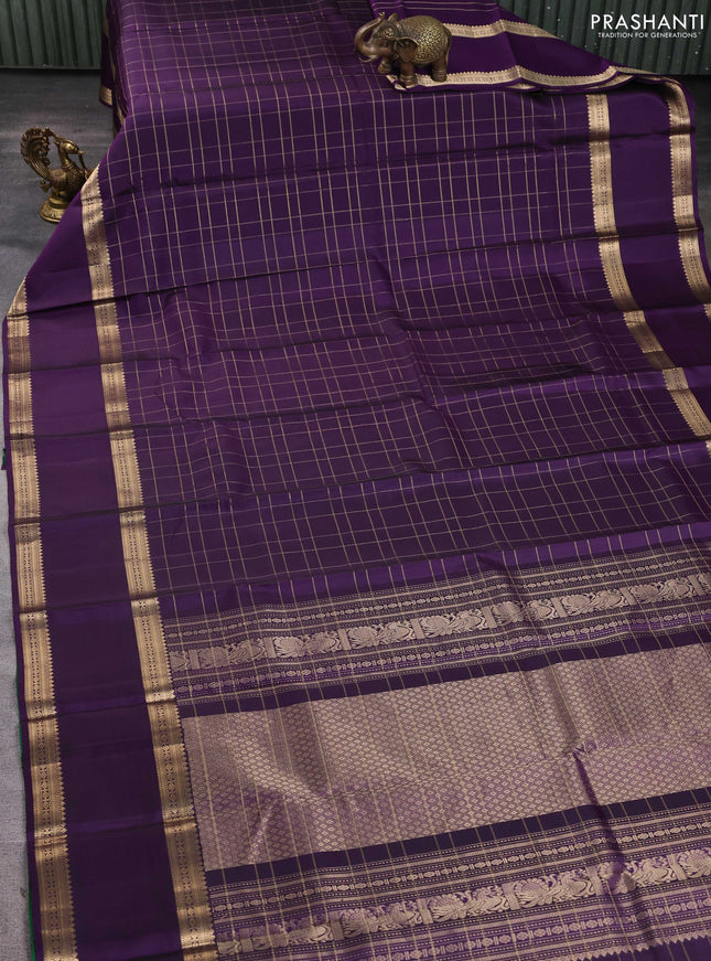 Pure soft silk saree purple with allover zari checked pattern and rettapet zari woven border