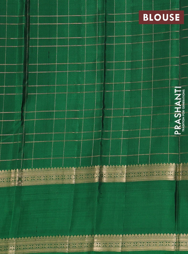 Pure soft silk saree purple with allover zari checked pattern and rettapet zari woven border