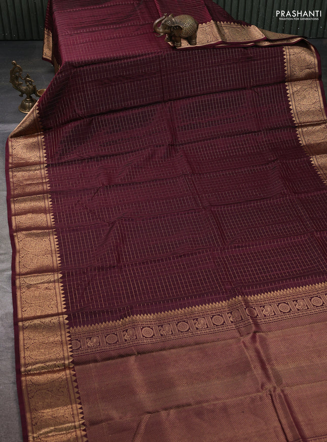 Pure soft silk saree maroon shade with allover zari checked pattern and paisley zari woven border