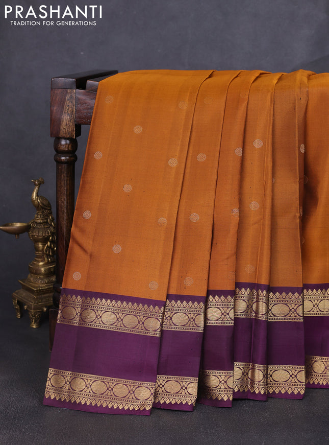 Pure soft silk saree rust shade and purple with zari woven buttas and long rettapet zari woven border