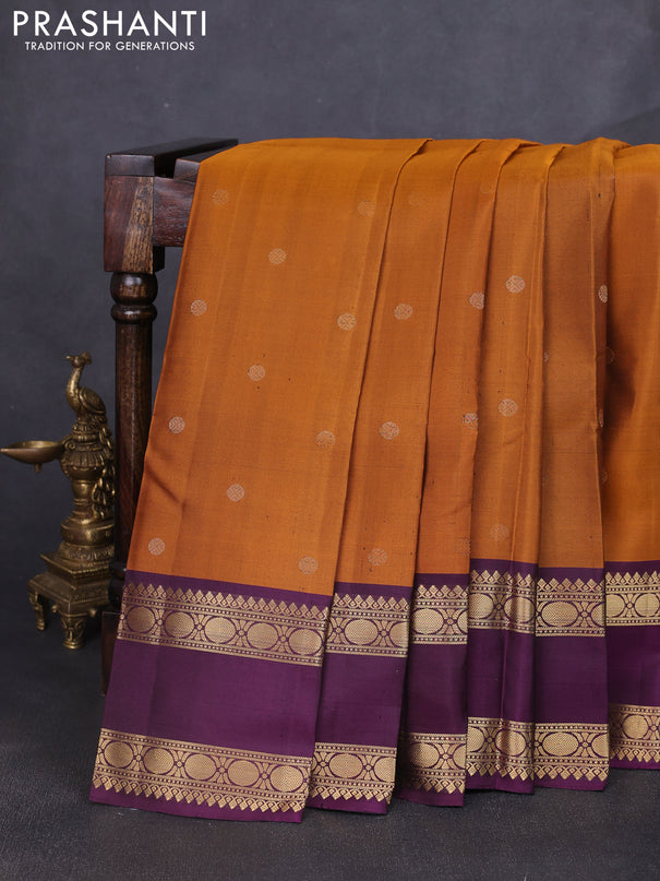 Pure soft silk saree rust shade and purple with zari woven buttas and long rettapet zari woven border
