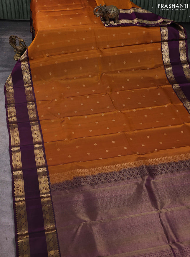Pure soft silk saree rust shade and purple with zari woven buttas and long rettapet zari woven border