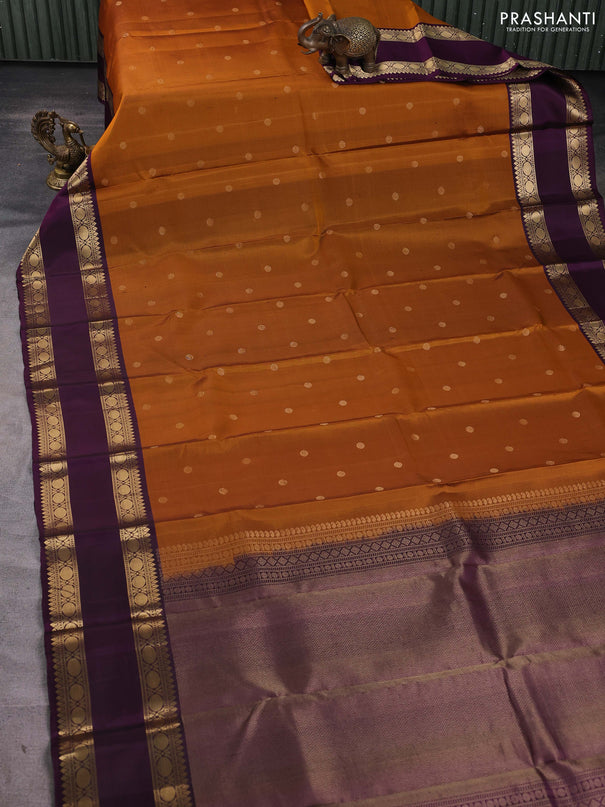 Pure soft silk saree rust shade and purple with zari woven buttas and long rettapet zari woven border