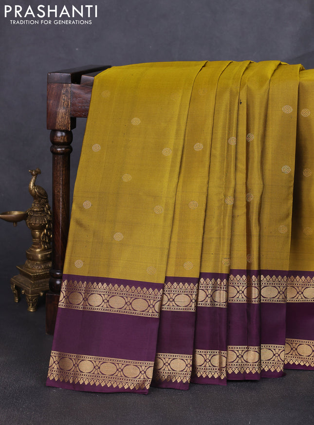 Pure soft silk saree dark mustard and purple with zari woven buttas and long rettapet zari woven border
