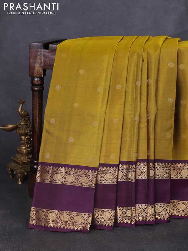 Pure soft silk saree dark mustard and purple with zari woven buttas and long rettapet zari woven border