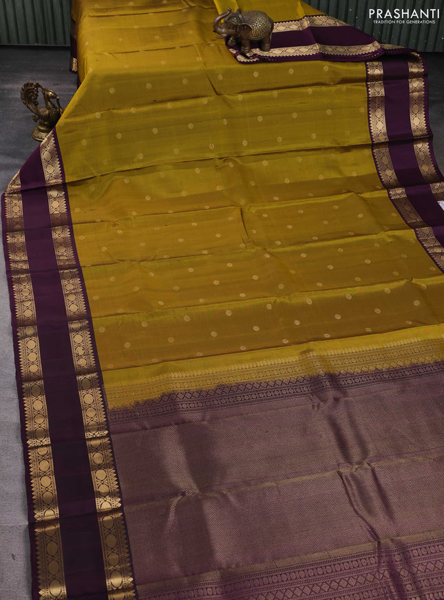 Pure soft silk saree dark mustard and purple with zari woven buttas and long rettapet zari woven border