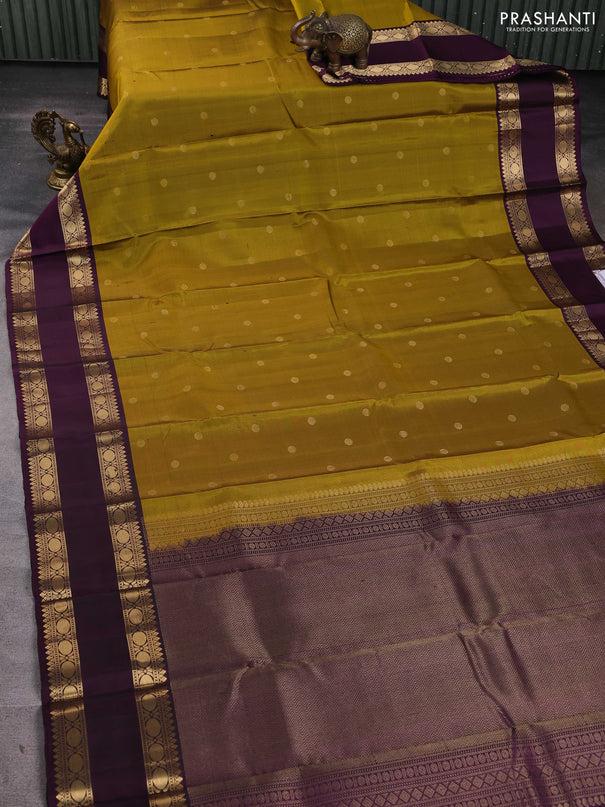 Pure soft silk saree dark mustard and purple with zari woven buttas and long rettapet zari woven border