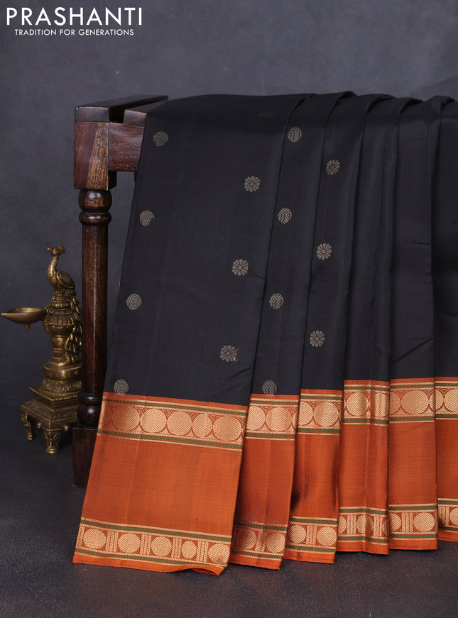 Pure soft silk saree black and rust shade with zari woven buttas and long rettapet zari woven border