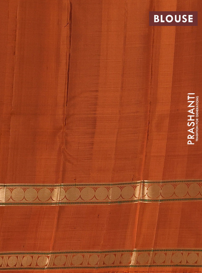 Pure soft silk saree black and rust shade with zari woven buttas and long rettapet zari woven border