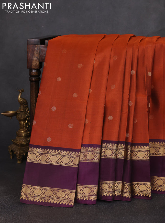 Pure soft silk saree rust shade and purple with zari woven buttas and long rettapet zari woven border