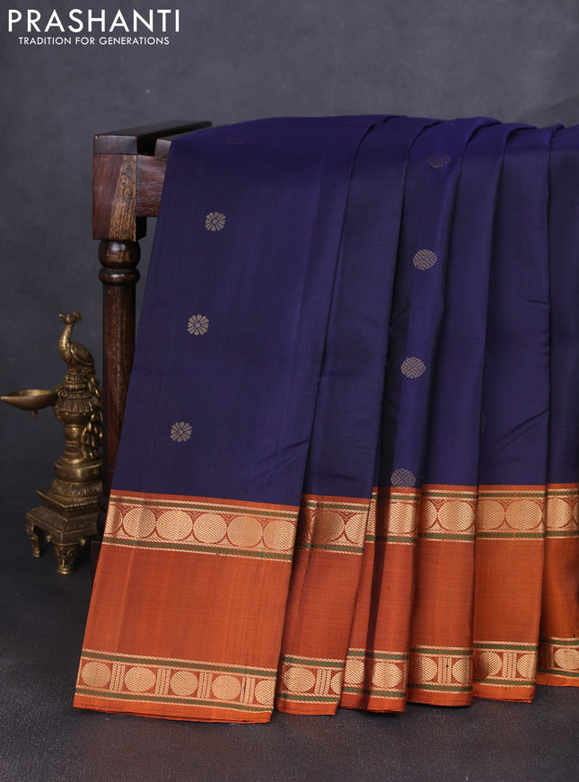 Pure soft silk saree dark blue and rustic orange with zari woven buttas and long rettapet zari woven border