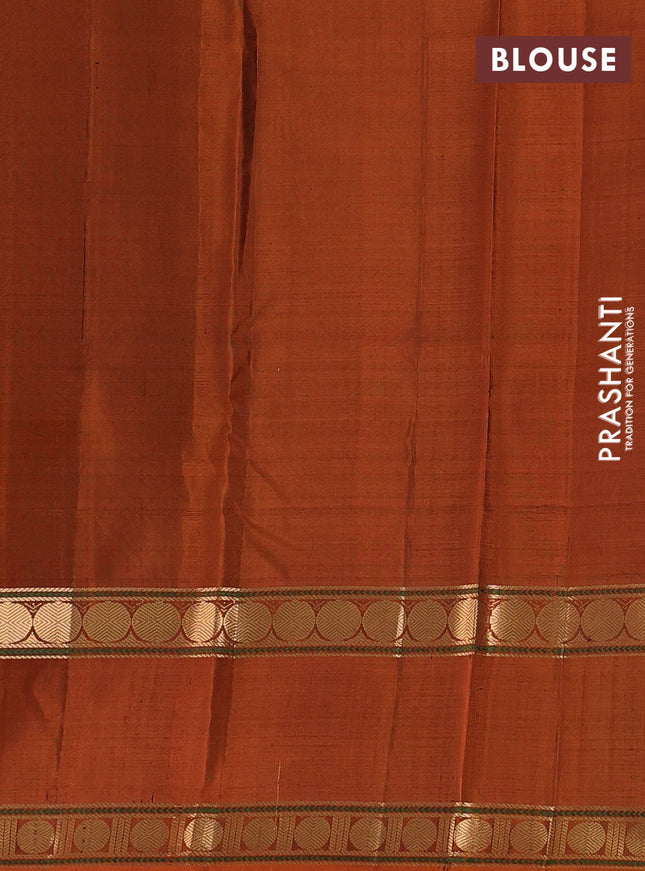 Pure soft silk saree dark blue and rustic orange with zari woven buttas and long rettapet zari woven border