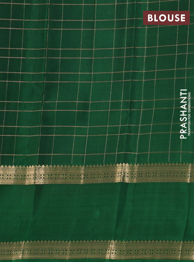 Pure soft silk saree dual shade of pink and green with allover zari woven checked pattern and long rettapet zari woven border