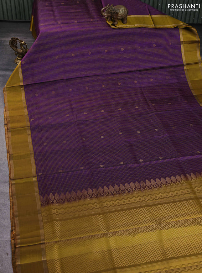Pure soft silk saree deep purple and dark mustard with allover zari checks & buttas and rettapet zari woven border