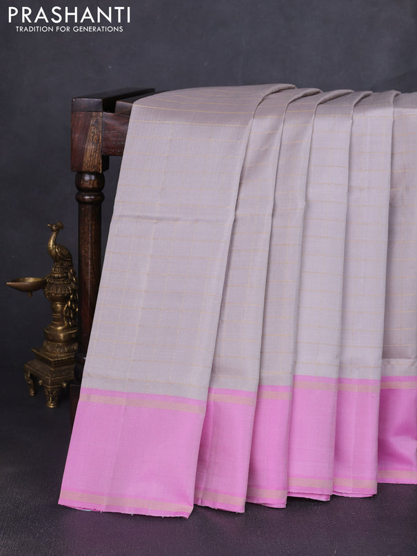 Pure soft silk saree grey and lotus pink with allover zari checked pattern and rettapet zari woven border