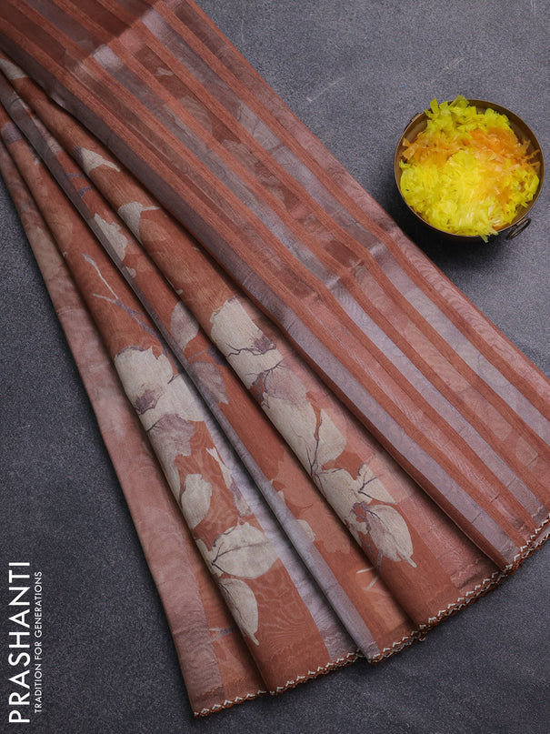 Organza tissue tussar saree rust shade with floral prints and lace work border