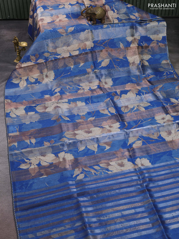 Organza tissue tussar saree cs blue with floral prints and lace work border