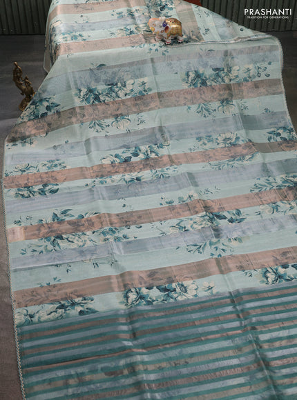 Organza tissue tussar saree pastel green with floral prints and lace work border
