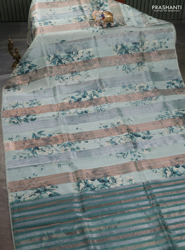 Organza tissue tussar saree pastel green with floral prints and lace work border