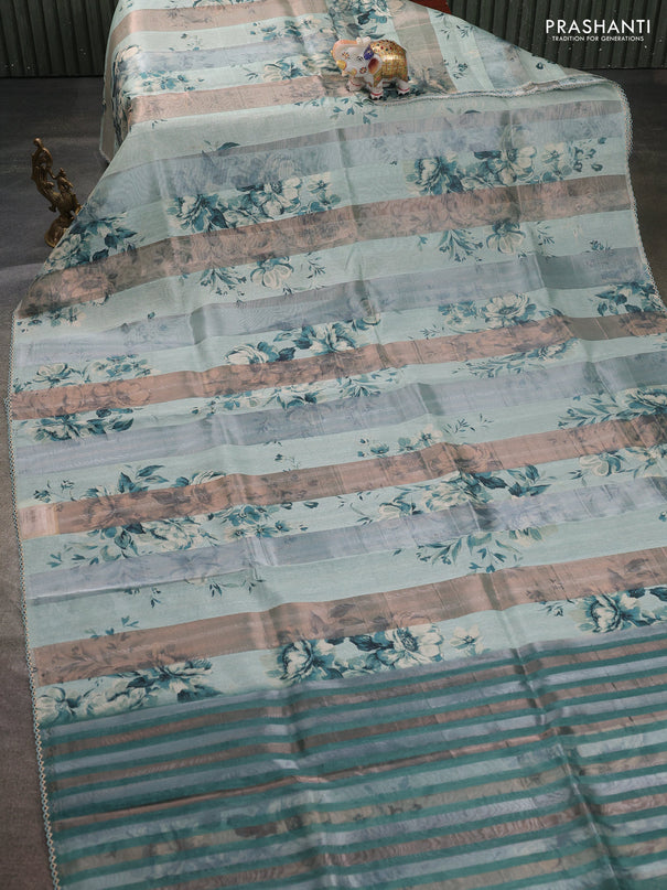 Organza tissue tussar saree pastel green with floral prints and lace work border