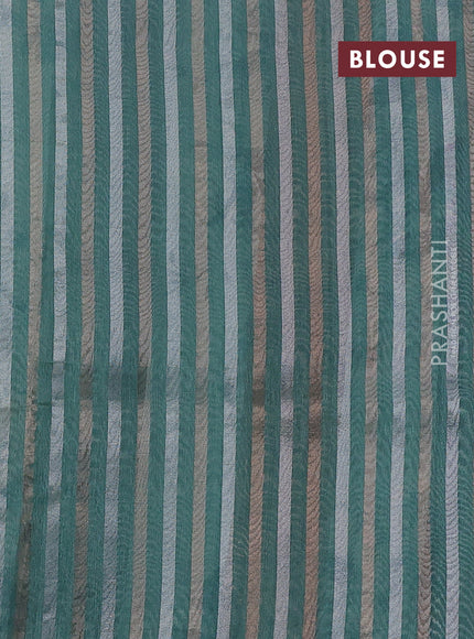 Organza tissue tussar saree pastel green with floral prints and lace work border