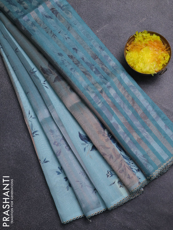 Organza tissue tussar saree light blue with floral prints and lace work border