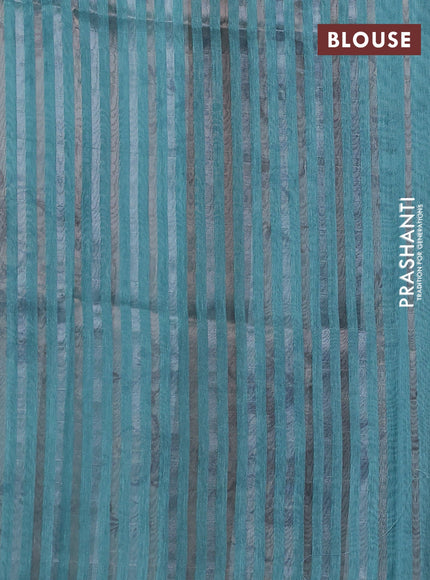 Organza tissue tussar saree light blue with floral prints and lace work border