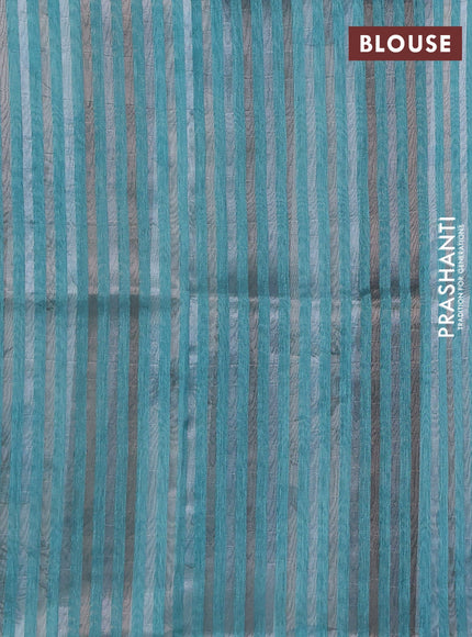 Organza tissue tussar saree teal shade with floral prints and lace work border