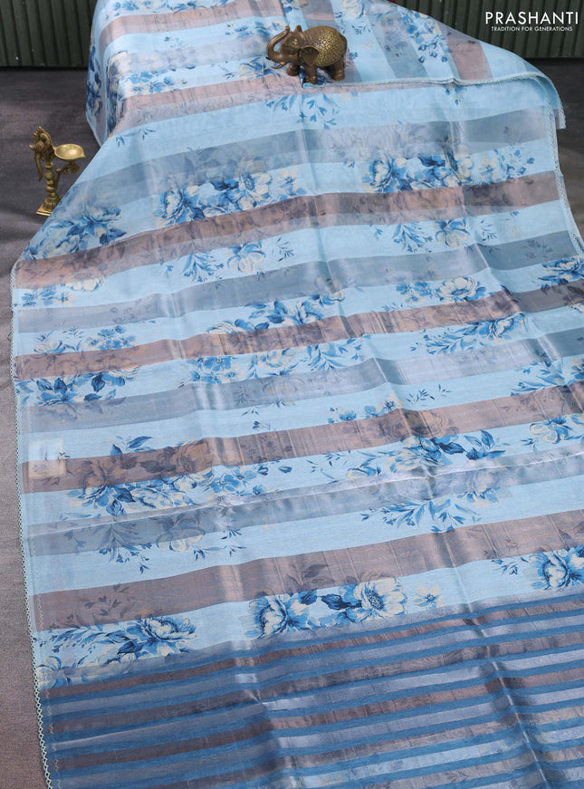 Organza tissue tussar saree light blue with floral prints and lace work border